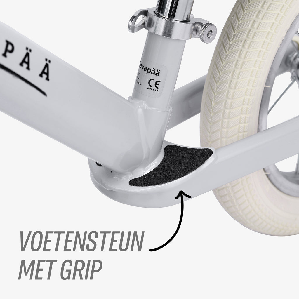 detail van geïntegreerde voetensteun op grijze Køvapää loopfiets