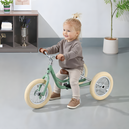 Kovapää 2 in 1 Loopfiets Groen, kind met een loopfiets binnen, leren balanceren met stijl